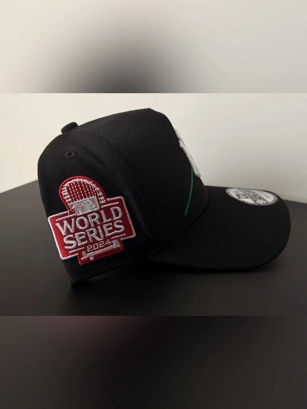 New Era Black Cap with White NY Logo and Red World Series Patch